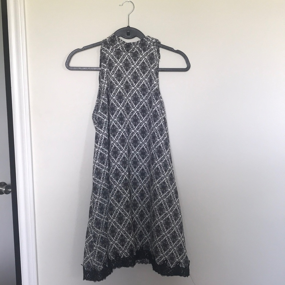 above the knee dress, sleeveless, high neck collar